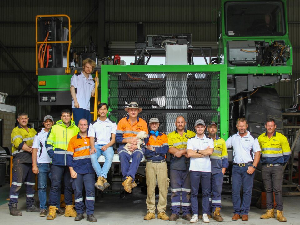 Clayton Franklin with the team at Electric Power Conversions Australia and their electrified Cat 777 100-tonne haul truck.